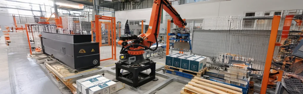 How E-Commerce Warehouses Benefit From Investing In Robotic Palletizing Technology 1 Warehouse automation robotic palletizer in e commerce industry. Jpg